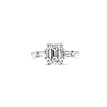 PLATINUM EMERALD CUT AND TAPERED BAGUETTE CUT DIAMOND RING