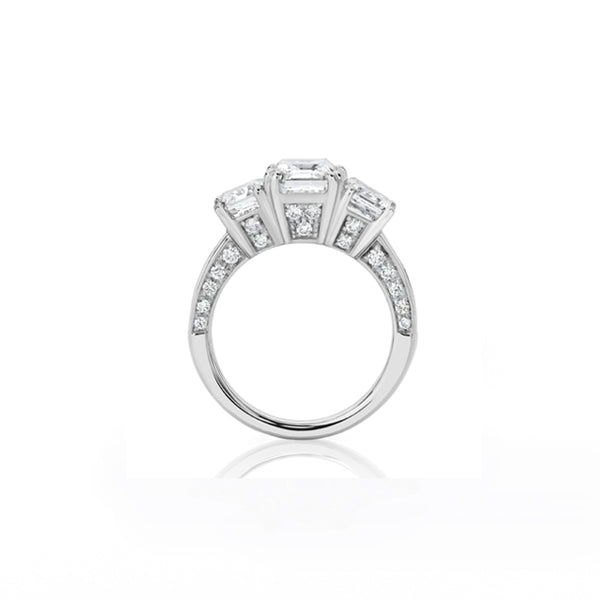 18CT WHITE GOLD THREE STONE EMERALD CUT RING WITH DIAMOND SET BAND (Image 2)