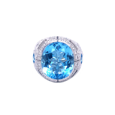 BLUE TOPAZ AND DIAMOND COCKTAIL RING SET IN 18CT WHITE GOLD