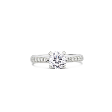 PLATINUM 1.08CT CENTO CUT DIAMOND AND PAVE SET ROUND BRILLIANT CUT DIAMOND RING