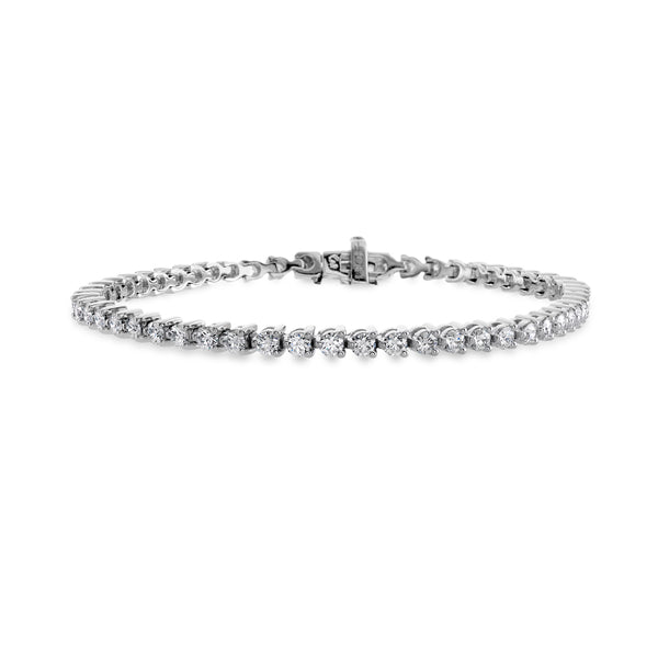 HEARTS ON FIRE 'TEMPTATION' 18CT WHITE GOLD THREE PRONG 5CT DIAMOND BRACELET (Image 1)