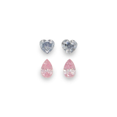 0.15CT = 2 X FANCY INTENSE PINK/SI2 PEARSHAPED ARGYLE PINK DIAMONDS. 0.19CT = 2 X FANCY GREYISH BLUE-FANCY BLUE-GREY/SI2 HEARTSHAPED ARGYLE PINK DIAMONDS - IGI COLLECTORS EDITION