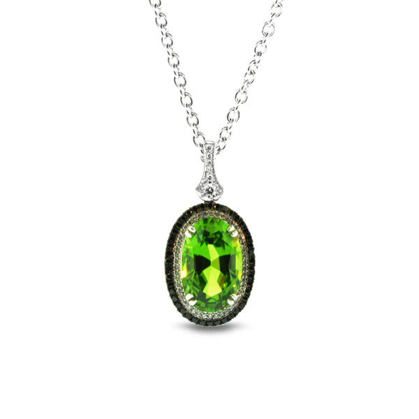 18CT WHITE GOLD, GREEN PERIDOT PENDANT WITH BLACK AND WHITE DIAMONDS (Image 1)