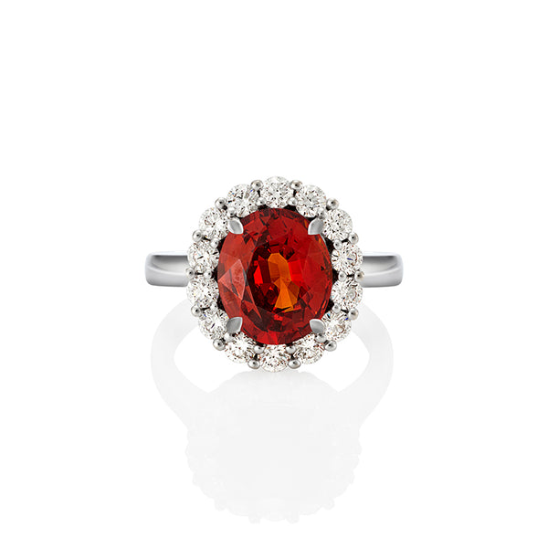 18ct WHITE GOLD 5.92ct OVAL SPESSARTITE GARNET & DIAMOND CLUSTER RING (Image 1)