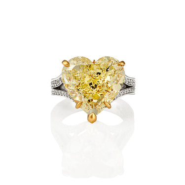 DIAMOND RING WITH 10.08CT FANCY YELLOW HEART SHAPE