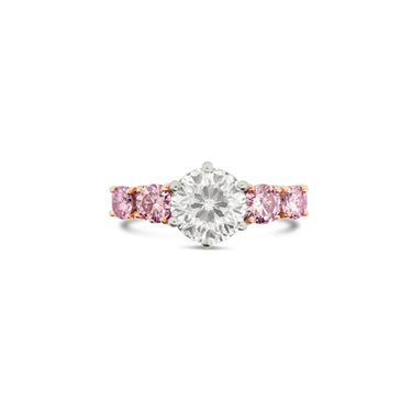 ARGYLE PINK DIAMOND AND WHITE DIAMOND PLATINUM AND ROSE GOLD RING