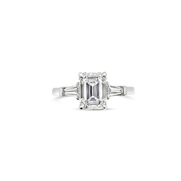 PLATINUM EMERALD CUT AND TAPERED BAGUETTE CUT DIAMOND RING (Image 1)