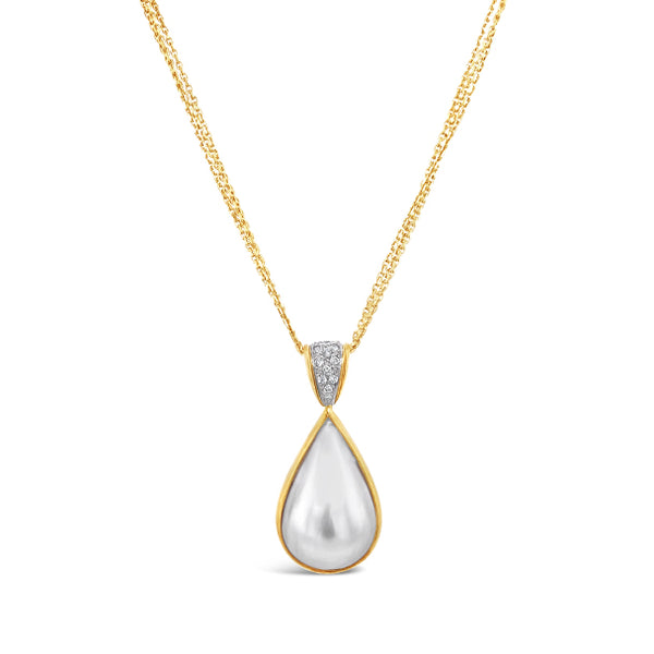 18CT YELLOW GOLD AND WHITE GOLD MABE PEARL AND DIAMOND PENDANT (Image 1)