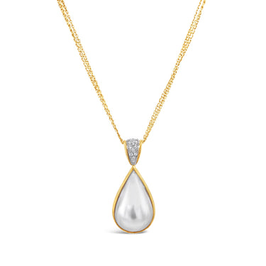 18CT YELLOW GOLD AND WHITE GOLD MABE PEARL AND DIAMOND PENDANT