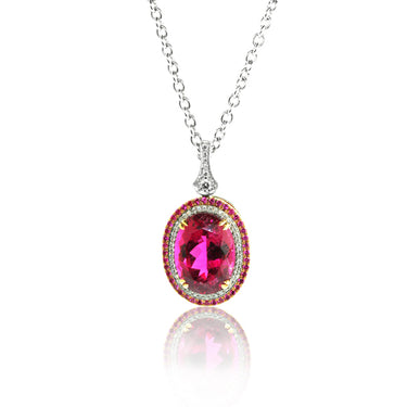 18CT WHITE AND ROSE GOLD RUBELLITE SAPPHIRE AND DIAMOND OVAL SHAPED PENDANT
